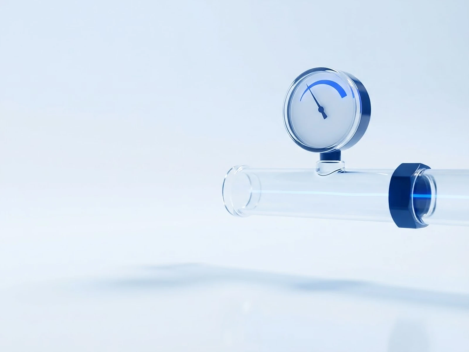 Glasrohr mit Manometer, der Zeiger steht im blauen Bereich: Wartungserinnerung, weil die Heizungswartung fällig ist.